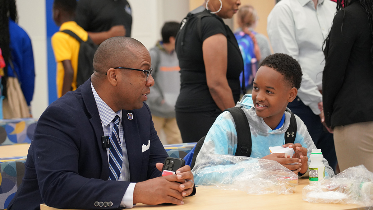 Superintendent-House-talking-with-student